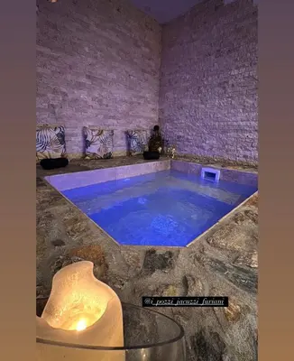 Piscine de l'établissement I pozzi jacuzzi furiani love room haute corse ou située à proximité