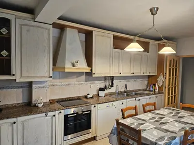 Cuisine ou kitchenette dans l'établissement Villa des fleurs
