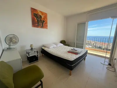 Un ou plusieurs lits dans un hébergement de l'établissement Appartement vintage Bastia - MAGNIFIQUE VUE !