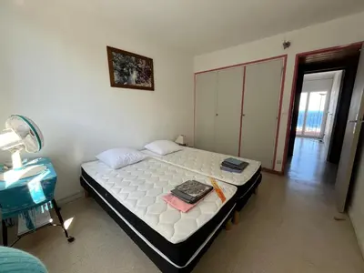 Un ou plusieurs lits dans un hébergement de l'établissement Appartement vintage Bastia - MAGNIFIQUE VUE !