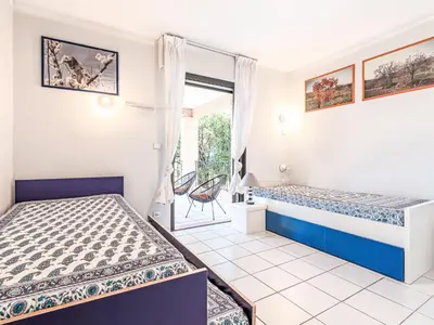 Un ou plusieurs lits dans un hébergement de l'établissement Apartment Giulia II by Interhome