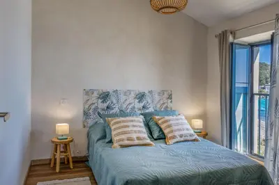 Un ou plusieurs lits dans un hébergement de l'établissement Villa Marine de Meria