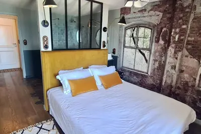 Un ou plusieurs lits dans un hébergement de l'établissement Appartement Bord de plage Vue mer