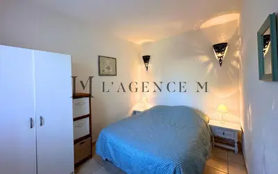 Un ou plusieurs lits dans un hébergement de l'établissement Appartement Salduccio Piscine tennis mini golf LUMIO