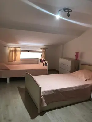 Un ou plusieurs lits dans un hébergement de l'établissement Charmante Maisonnette t2bis plaine de Calenzana
