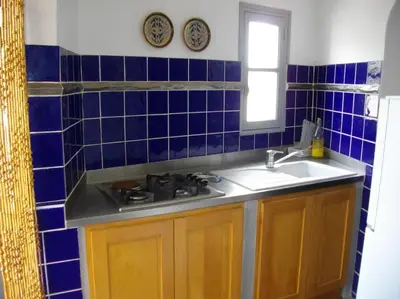 Cuisine ou kitchenette dans l'établissement La maison du pêcheur à Porticciolo Cap-Corse