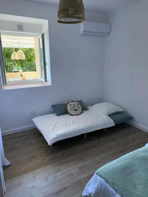 Un ou plusieurs lits dans un hébergement de l'établissement U Fiume - Appartement 5 personnes