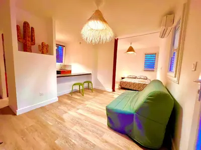 Un ou plusieurs lits dans un hébergement de l'établissement Superbe logement bord de mer contigu à la Marine de Davia