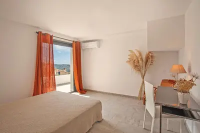 Un ou plusieurs lits dans un hébergement de l'établissement Villa Bellagio avec vue exceptionnelle