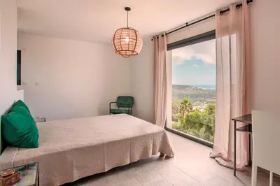 Un ou plusieurs lits dans un hébergement de l'établissement Villa Bellagio avec vue exceptionnelle