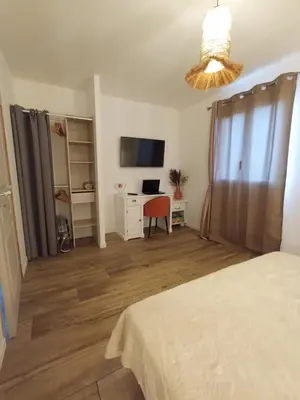 Télévision ou salle de divertissement dans l'établissement Maisonnette 55m2 Lozari