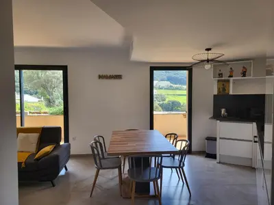 Télévision ou salle de divertissement dans l'établissement Vue Mer & Montagne