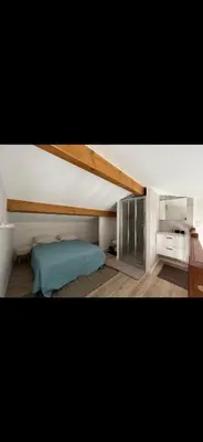 Un ou plusieurs lits dans un hébergement de l'établissement Appartement Oriana