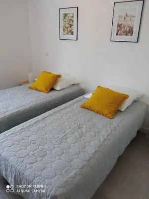 Un ou plusieurs lits dans un hébergement de l'établissement Villa neuve à 900 m de la plage