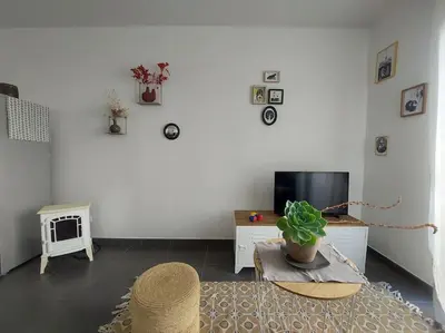 Télévision ou salle de divertissement dans l'établissement Namastĕ
