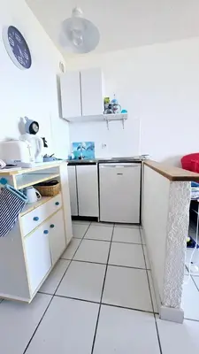 Cuisine ou kitchenette dans l'établissement Studio les pieds dans l'eau