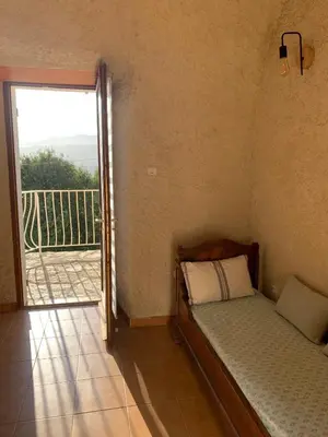 Un ou plusieurs lits dans un hébergement de l'établissement Maison indépendante Haute-Corse mer et montagne