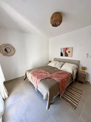 Un ou plusieurs lits dans un hébergement de l'établissement Appartement HARMONIE