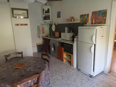 Cuisine ou kitchenette dans l'établissement Maisonnette
