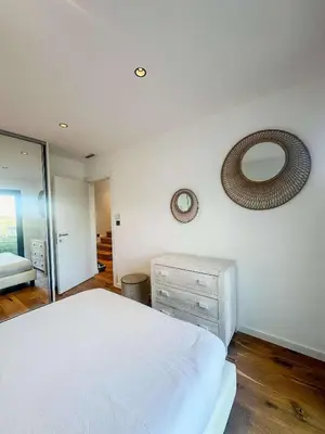 Un ou plusieurs lits dans un hébergement de l'établissement Sublime villa vue mer pieds dans l'eau