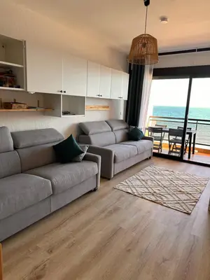 Coin salon dans l'établissement Studio les pieds dans l'eau