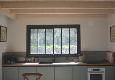 Cuisine ou kitchenette dans l'établissement BergerieMuratinca privacy piscine vue mer 16 pers - location du samedi au samedi