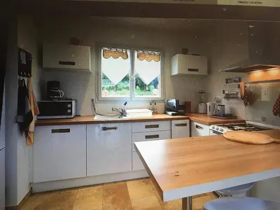 Cuisine ou kitchenette dans l'établissement La Carpe Diem