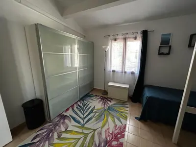 Un ou plusieurs lits dans un hébergement de l'établissement Maison bord de mer en Corse