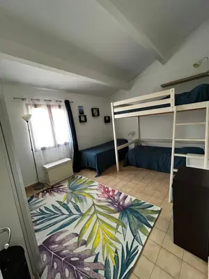 Un ou plusieurs lits dans un hébergement de l'établissement Maison bord de mer en Corse