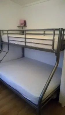 Un ou plusieurs lits dans un hébergement de l'établissement Maison bord de mer climatisée en Corse