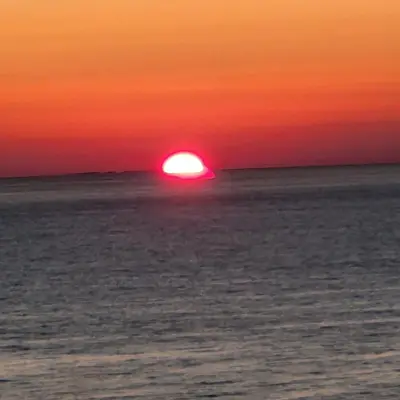 Lever ou coucher de soleil vu de l'appartement ou à proximité