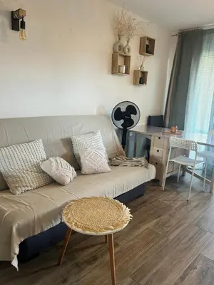 Coin salon dans l'établissement Appartement au bord de mer