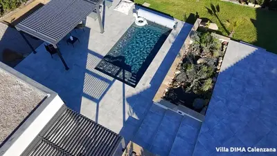 Piscine de l'établissement Villa DIMA - piscine chauffée climatisation barbecue pétanque ou située à proximité