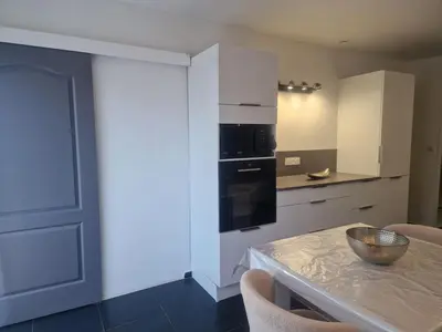 Cuisine ou kitchenette dans l'établissement Appartement a 2 pas de la plage
