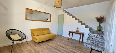 Coin salon dans l'établissement Spacieux haut de villa 3 chambres Venaco