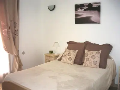 Un ou plusieurs lits dans un hébergement de l'établissement Casa di Lumio, piscine privée