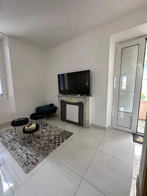 Télévision ou salle de divertissement dans l'établissement Superbe appartement en centre ville