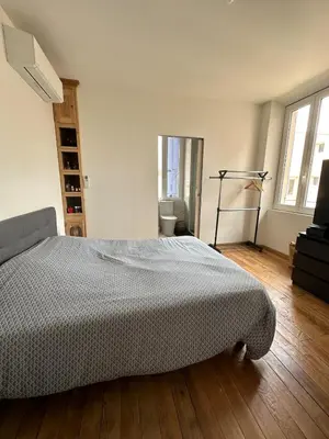 Un ou plusieurs lits dans un hébergement de l'établissement Superbe appartement en centre ville