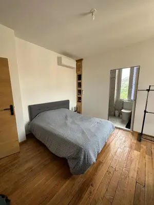 Un ou plusieurs lits dans un hébergement de l'établissement Superbe appartement en centre ville