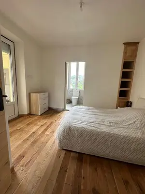Un ou plusieurs lits dans un hébergement de l'établissement Superbe appartement en centre ville