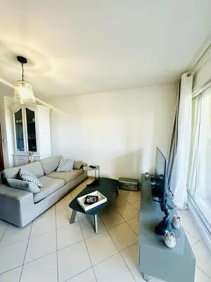 Coin salon dans l'établissement Appartement 2 chambres