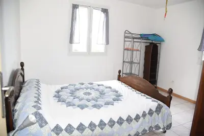 Un ou plusieurs lits dans un hébergement de l'établissement Appartement Coté mer