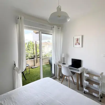 Un ou plusieurs lits dans un hébergement de l'établissement Appartement cosy avec wifi en bord de mer