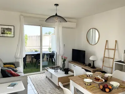 Coin salon dans l'établissement Appartement cosy avec wifi en bord de mer