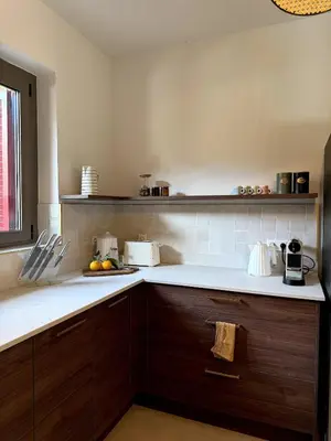 Cuisine ou kitchenette dans l'établissement Résidence Hôtelière CASA DI BABBÒ, Porto