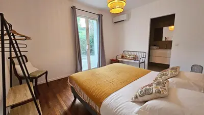 Un ou plusieurs lits dans un hébergement de l'établissement Maison de Maître Albitru - Domaine Romella - Piscine - Vue Golfe St-Florent