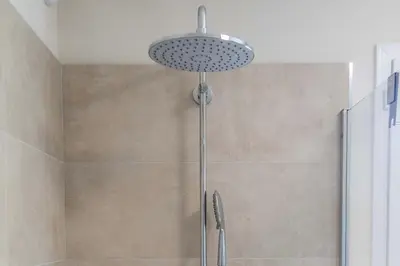 Salle de bains dans l'établissement Résidence hôtelière D'Amare