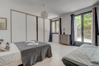 Un ou plusieurs lits dans un hébergement de l'établissement Villa Marielle - 360 m² avec piscine privé