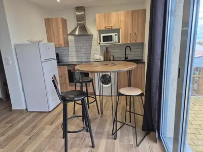 Cuisine ou kitchenette dans l'établissement Vos vacances à 3 minutes de la mer