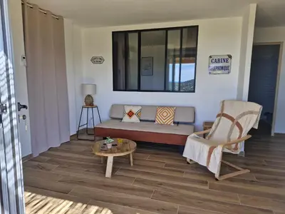 Coin salon dans l'établissement Vos vacances à 3 minutes de la mer